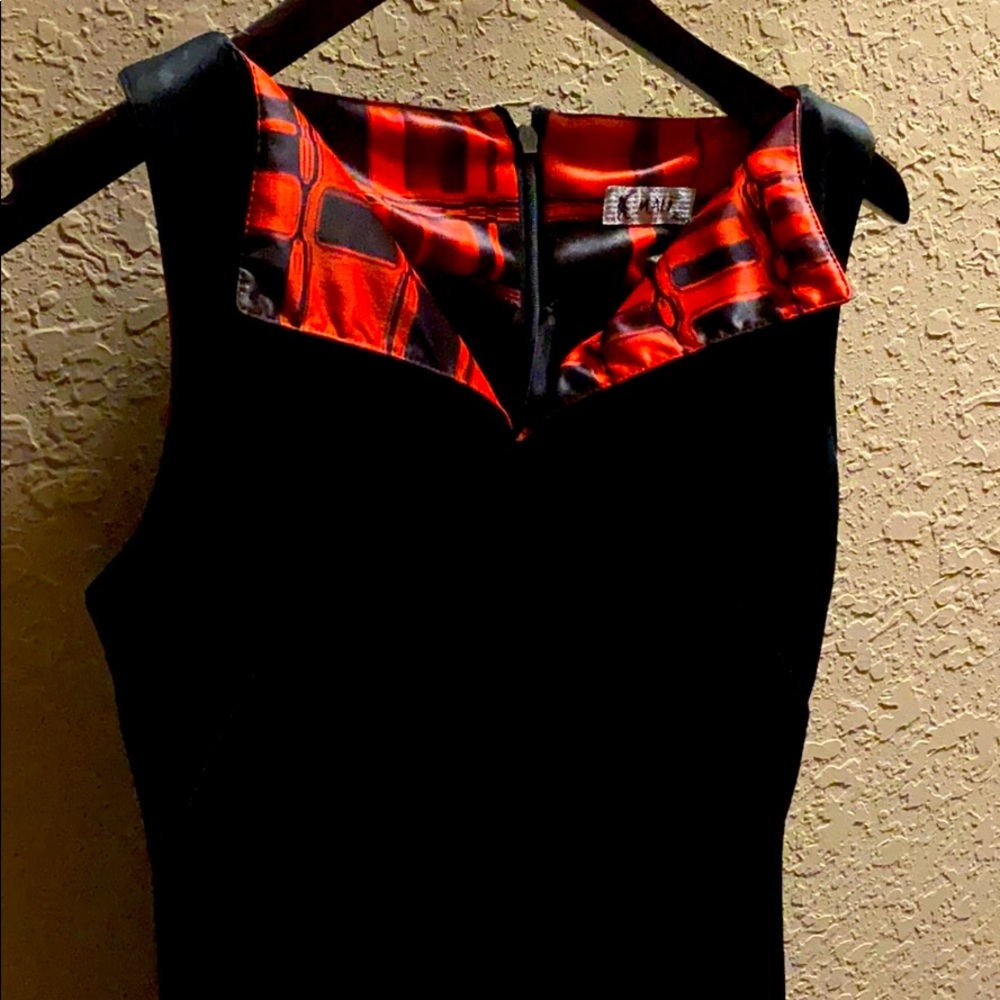 Black leather like dress with dee red cutouts